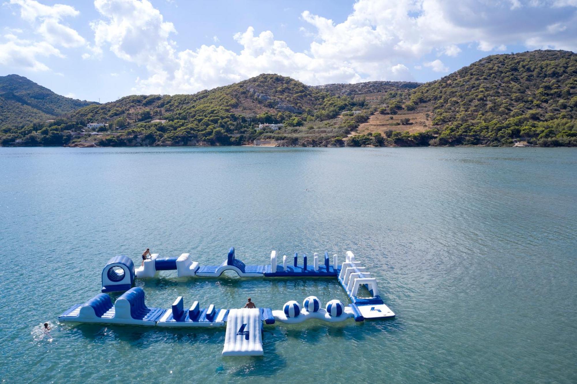 Hotel Dolce By Wyndham Athens Attica Riviera Vravrona Exterior foto The water park at the lake